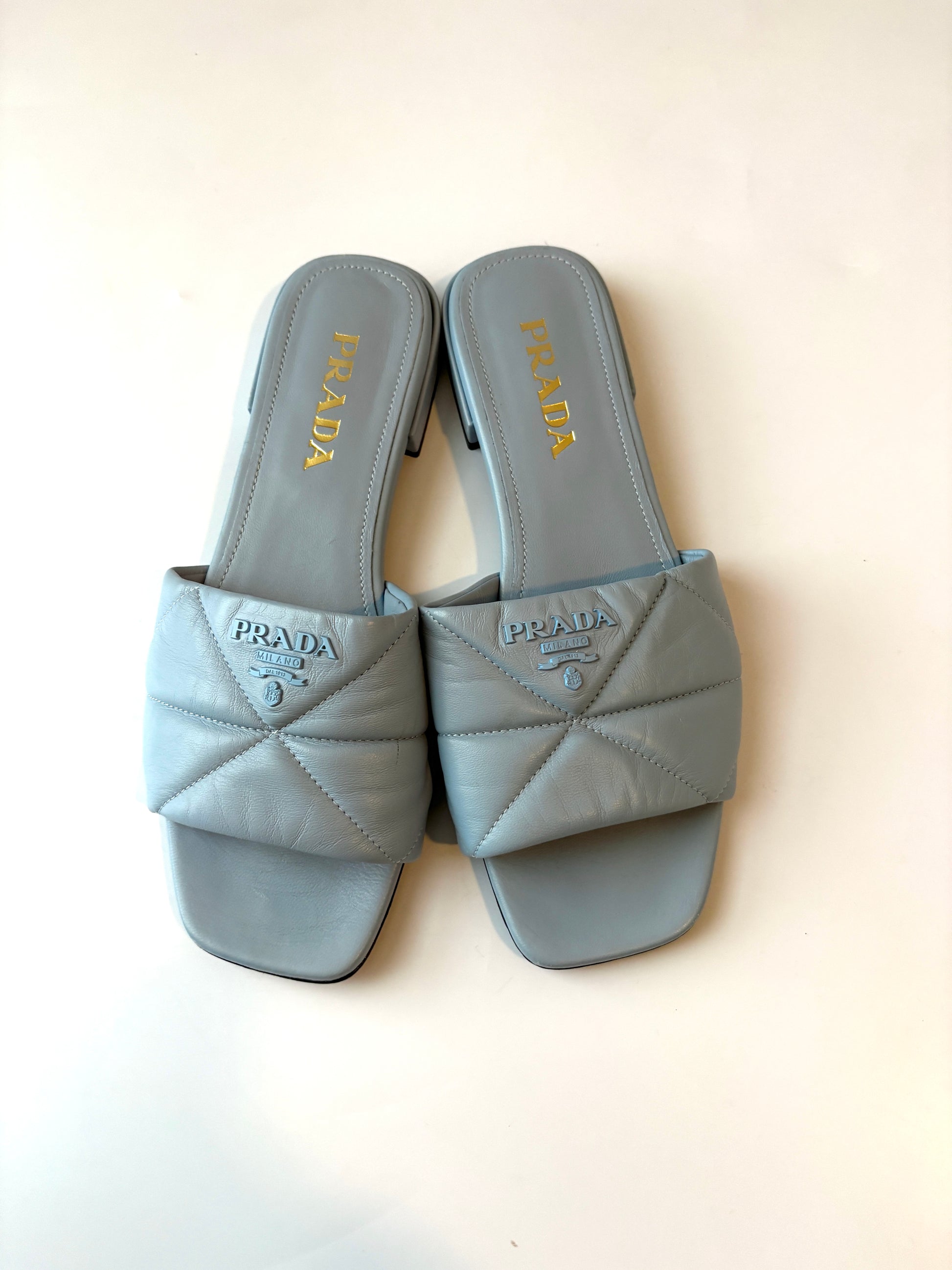 Prada Blue Quilted Leather Slides